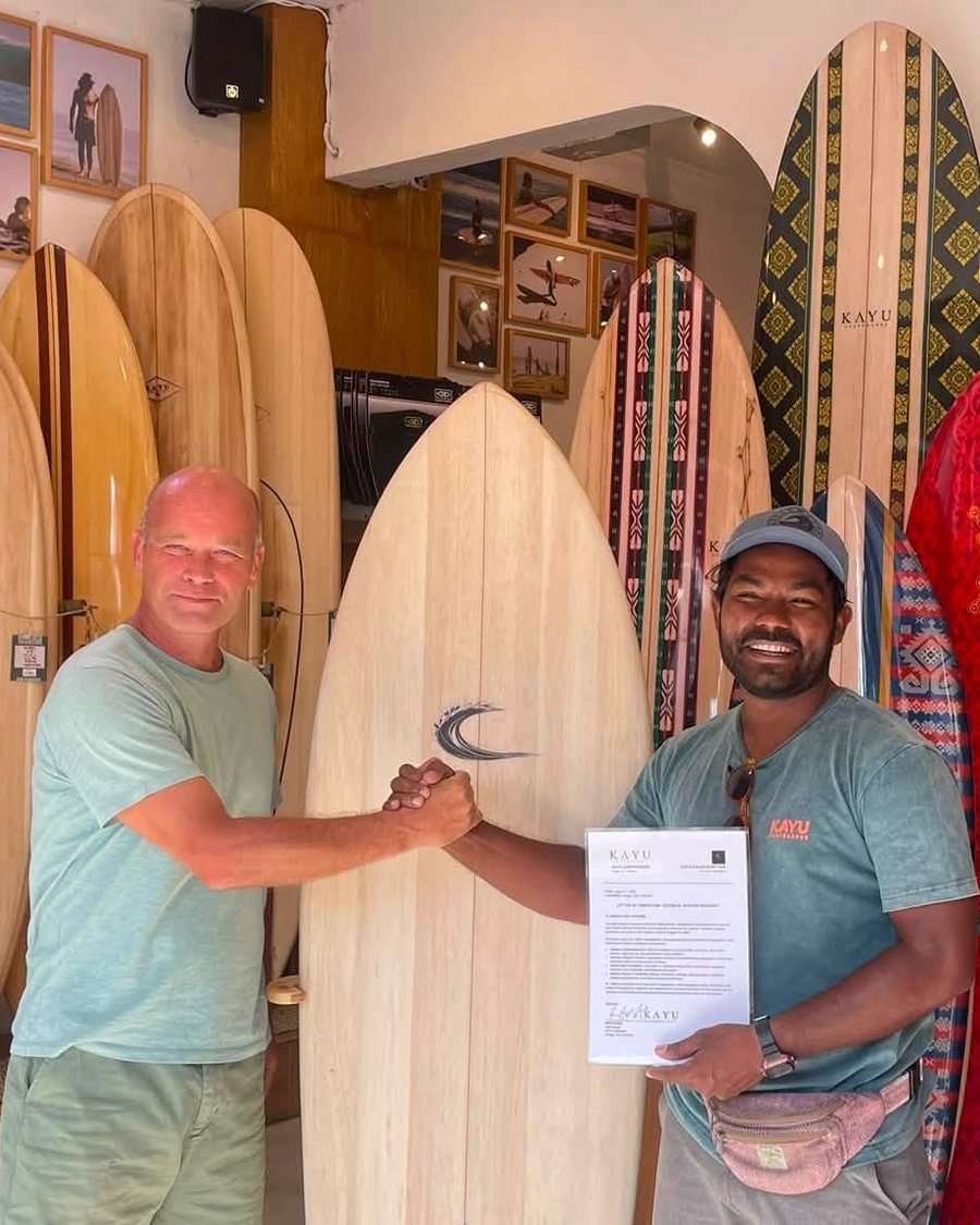 Fahad receiving his Technical Shaping Residency completion letter at KAYU Surfboards, Canggu