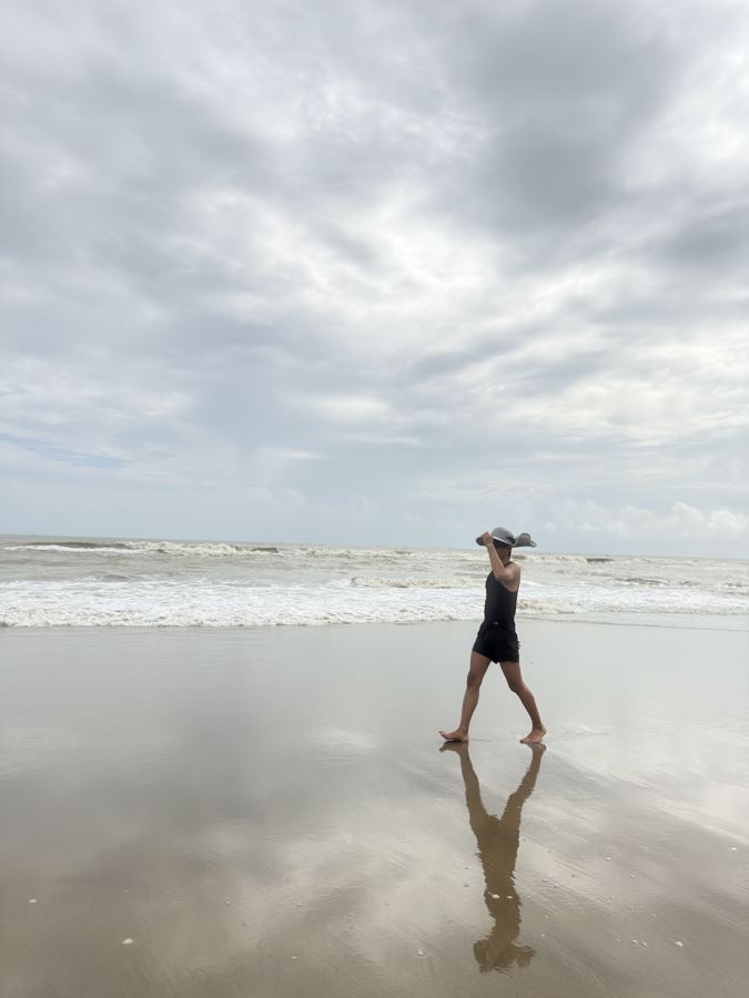 A quiet walk along the shoreline at Cox's Bazar