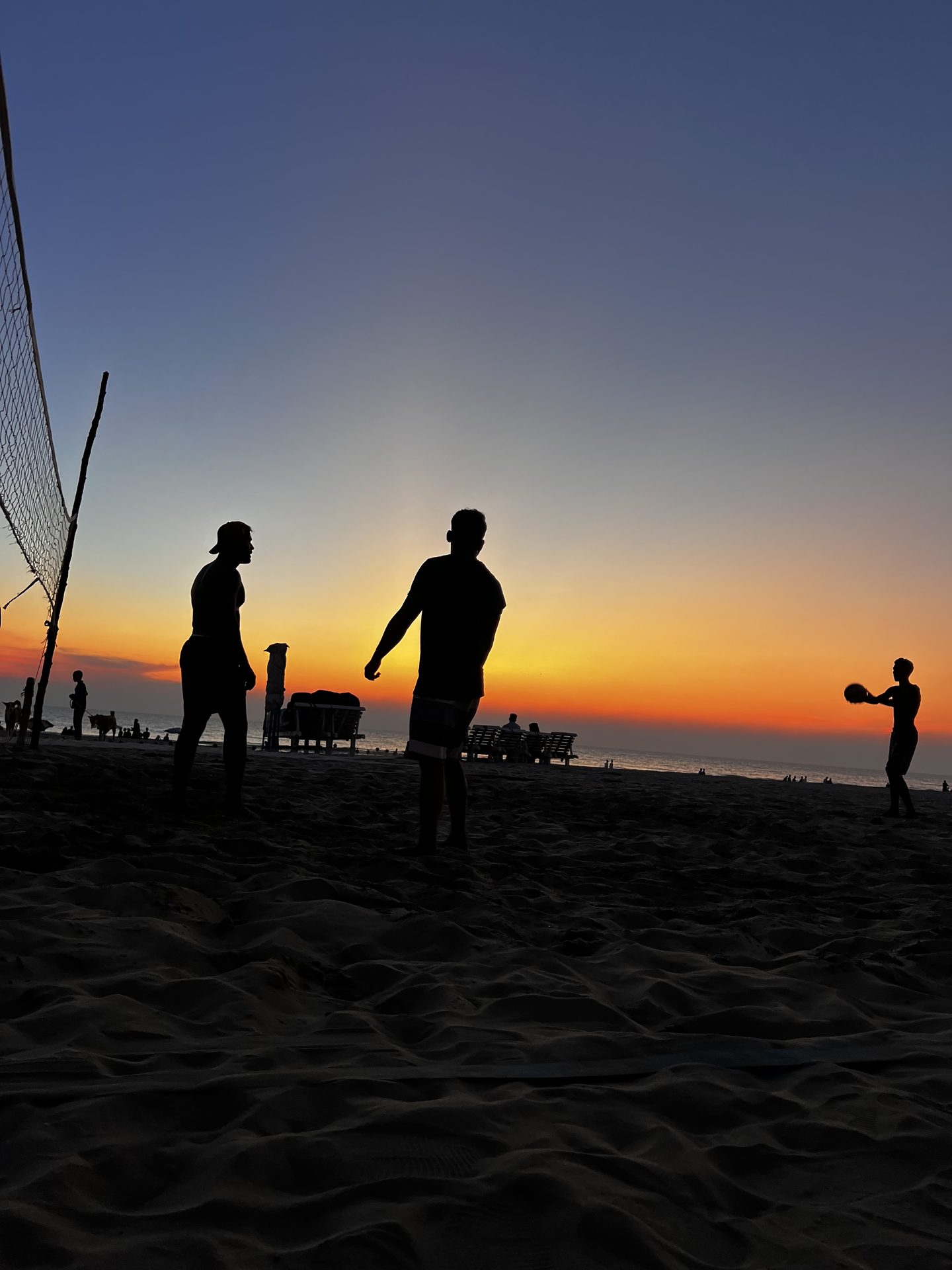 Beach volleyball at sunset on Cox's Bazar sand